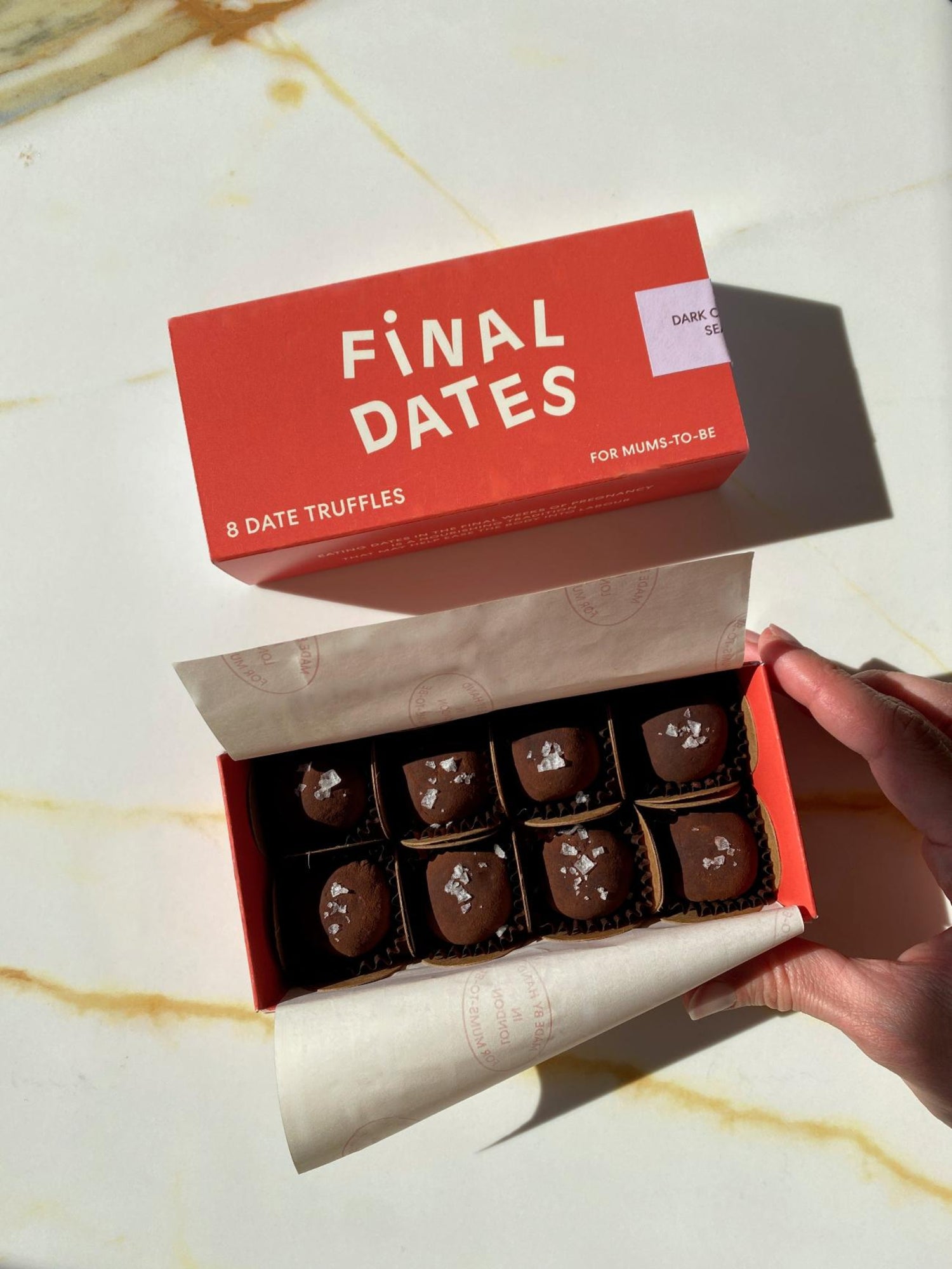 A box of chocolate date truffles for mums-to-be in Final Dates branded packaging